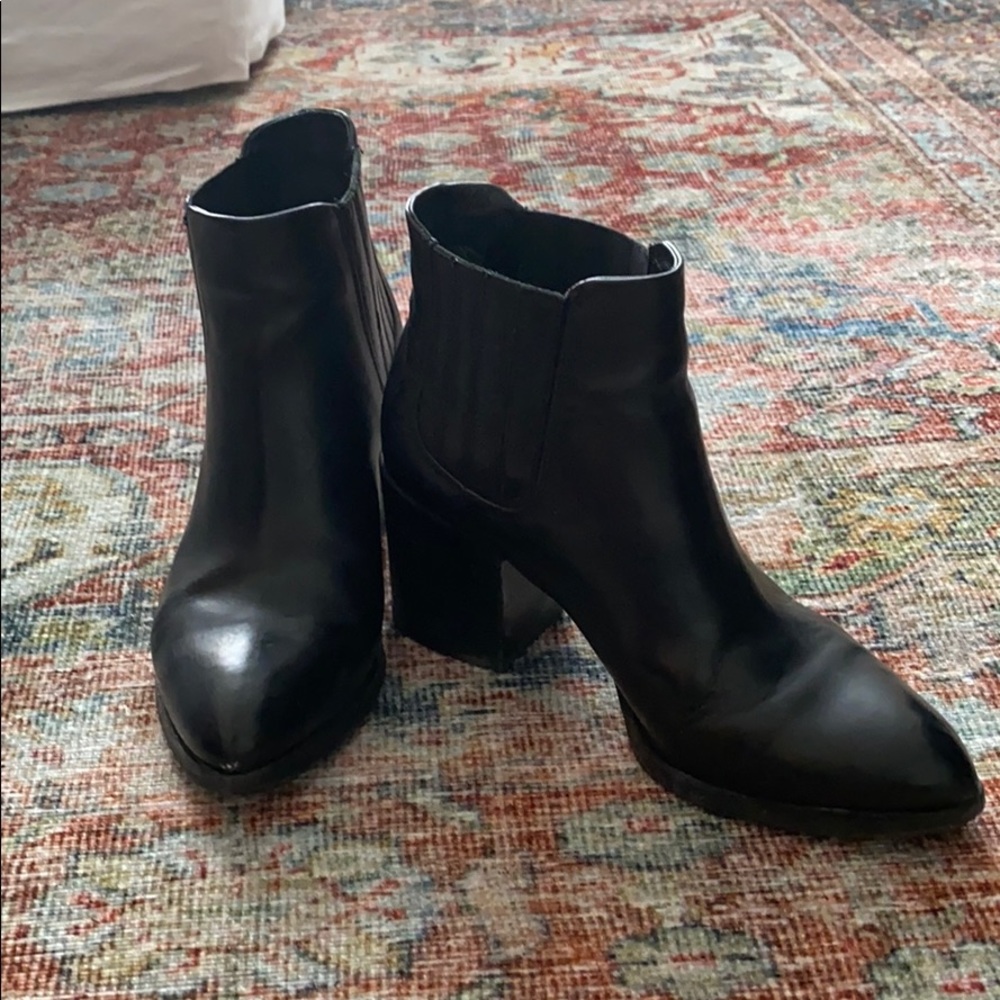 Alberto Fermani black leather heeled booties.